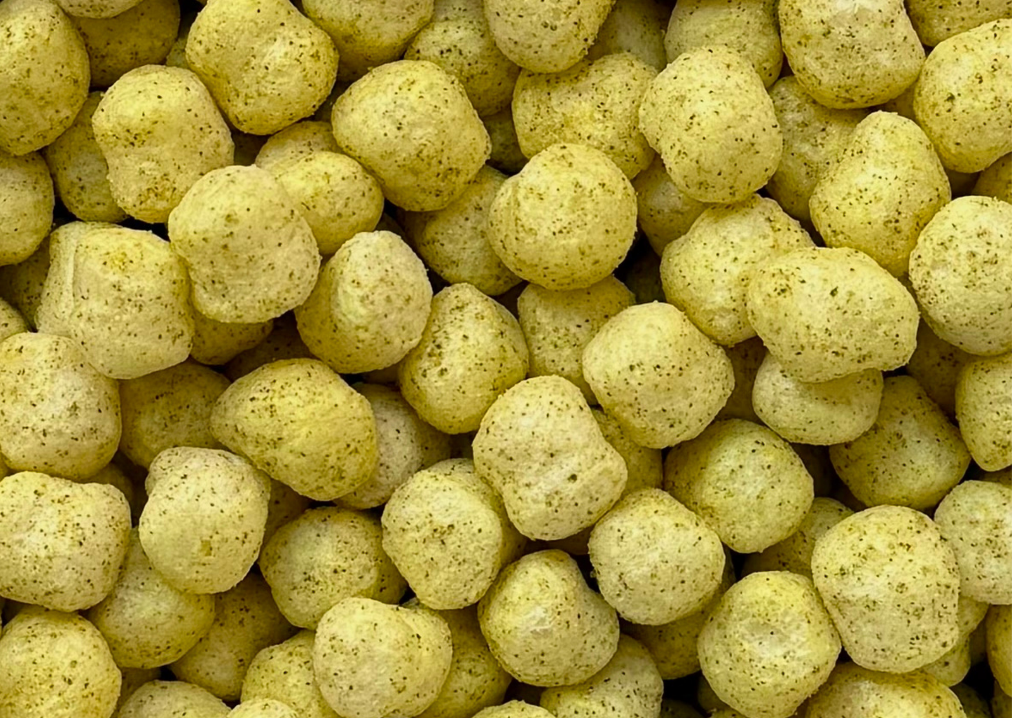 close up of zesty savory sorghum puffs nomnomz snack made in charlotte nc