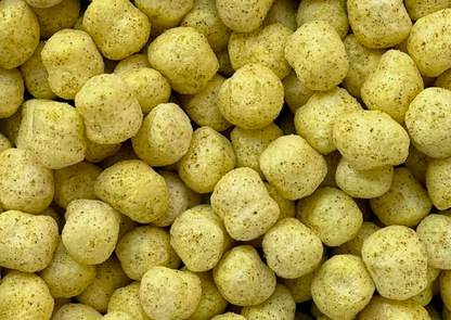 close up of zesty savory sorghum puffs nomnomz snack made in charlotte nc